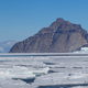 Let’s not walk on this ice, yeah? Here we see shorefast ice beginning to break up near Uummannaq, Greenland.